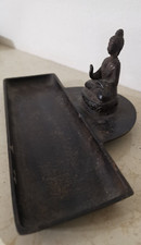 Statuetta Buddha in bronzo seduto con la mano alzata in gesto  di benedizione