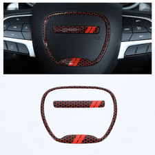 Coprivolante emblema trim