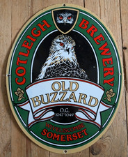 OLD BUZZARD ENAMEL SIGN -