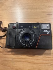 🏷️ Nikon L35AF2 - Fotocamera compatta 35 mm (non testata, da collezione) Nera