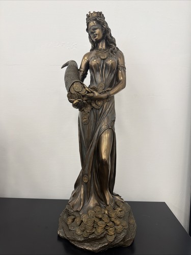 Scultura resina bronzata - in,