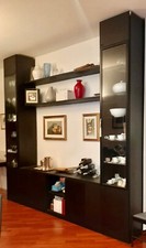 Mobile soggiorno moderno della Tisettanta. Laccato nero con due colonne vetrina.