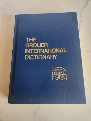 The grolier international - the,