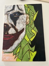 Joker Pirografato Su legno Disegnato E Dipinto A Mano.  30 X 21