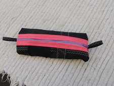 astuccio artigianale fatto con vela kitesurf nero rosa
