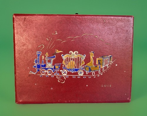 Valigia vintage rossa metà