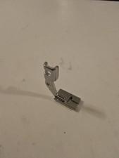 Piedino pressa per macchina da