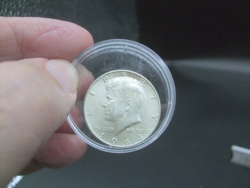 Half silver dollar - half,