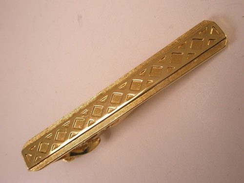 Fermacravatta vintage tono oro