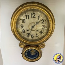 Orologio da parete tipo molla