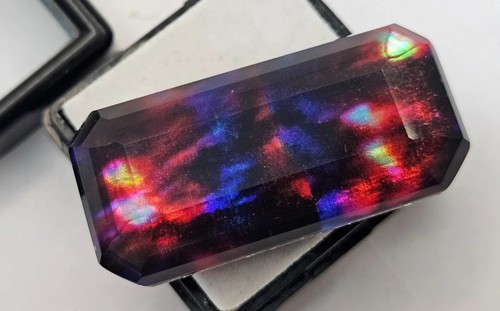 Ammolite emerald cut - cut, opal-like