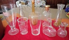 9 contenitori vetro (bottiglie, bottigliette e bicchieri )