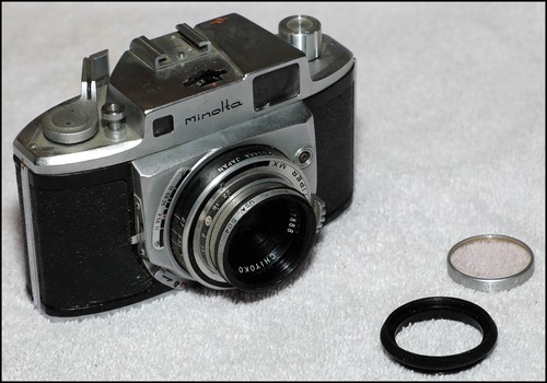 Minolta 35mm with - "a",