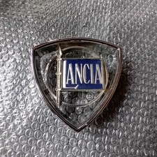 SCUDETTO STEMMA FREGIO MASCHERINA ANTERIORE LANCIA FULVIA COUPE NOS