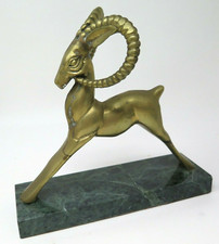 Stambecco corno curvo ottone