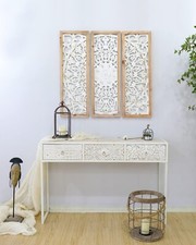 Pannelli in legno intagliato