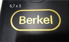 Coppia di Adesivi BERKEL oro, per restauro affettatrici. 6,7cmx3cm