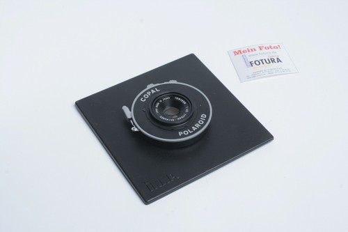 Polaroid tominon mm con - tominon,