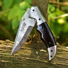 Coltello pieghevole fatto a