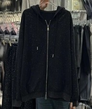 Giacca nera con cappuccio zip