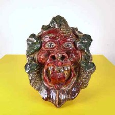 scultura maschera bacco in