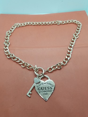 Collana con ciondolo - tono, oro