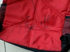 ZAINO FERRARI CON AUTOGRAFO DI TROY BAYLISS PILOTA DUCATI N. 12 