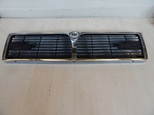 CALANDRA MASCHERINA ORIGINALE LANCIA THEMA 1 SERIE CON TERGIFARI