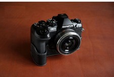 Custodia mezza fotocamera in