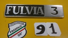 SCRITTA "FULVIA 3 "LOGO LANCIA STEMMA POSTERIORE BADGE IN METALLO LANCIA FULVIA 