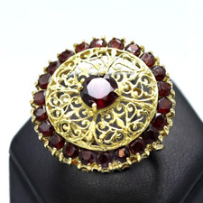 Anello grande con granati