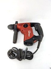 Trapano a percussione rotativo