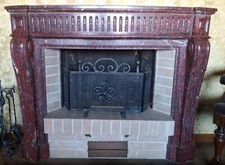 camino in marmo "rouge