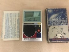 Vintage anni 80 CASIO CG-110 Cosmo Fighter 1982 Game & Watch