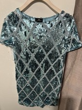 ✨ Top elegante firmato