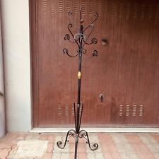 attaccapanni da terra in ferro battuto. Usato e in discrete condizioni