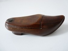 Tabacco in legno zoccolo arte