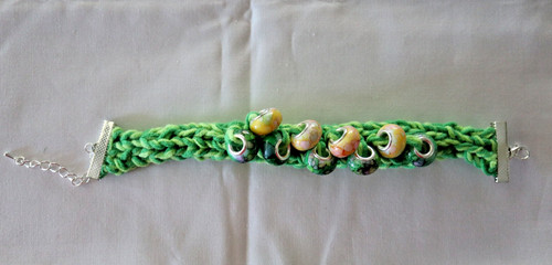 Bracciale lavorato mano e - bracciale, a