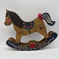 Cavallo a dondolo in legno