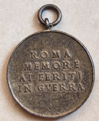 Medaglia roma memore feriti - ai,