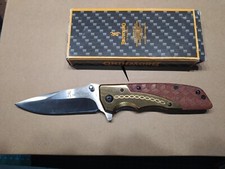 Coltello Da Caccia Browning pieghevole lama 9,5 cm. in acciaio DA77