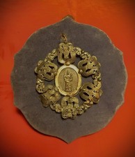 Antico medaglione battesimale