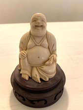ANTICO BUDDHA RIDENTE