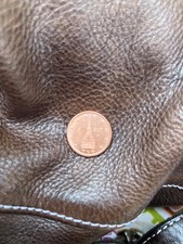 Moneta da 2 centesimi con raffigurata la mole antonelliana. errore conio