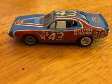 Tyco Caricabatteria Auto 43