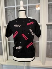 Maglia donna nera e rosa logo