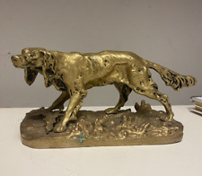 Scultura in bronzo francese raffigurante cane di tipo spaniel secolo XX