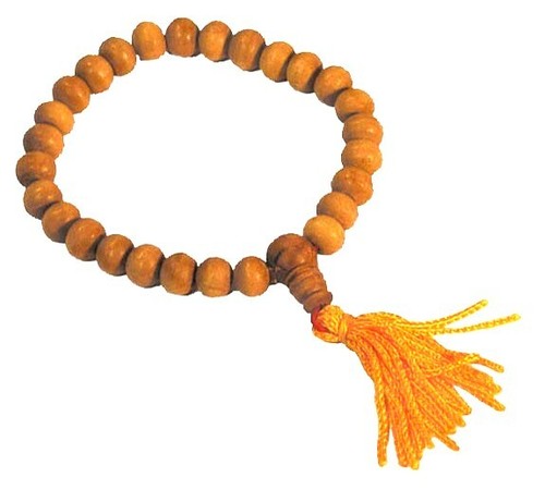 Bracciale mala perle legno - in,