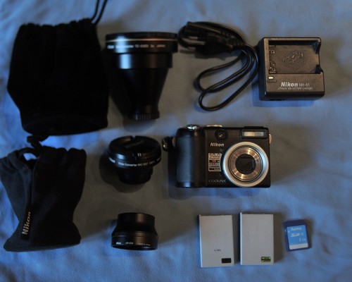 Nikon coolpix p5000 e67 - +, +