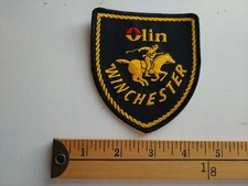 * 90S WINCHESTER OLIN PISTOLA